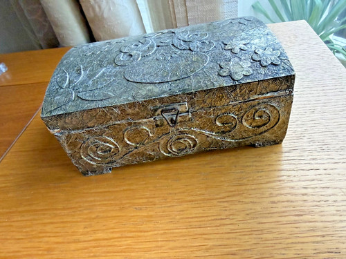 Ornate silver foil covered - ornate,